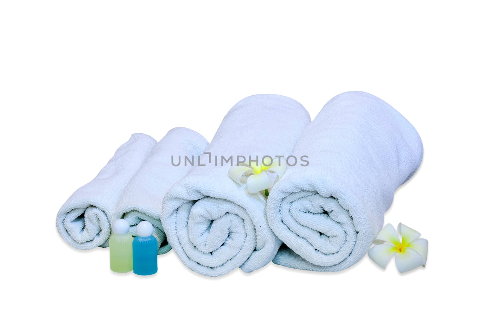 rolled up white beach towel