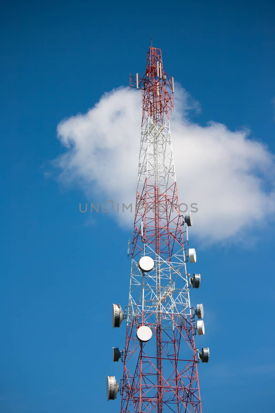 Telecommunication tower under blue sky