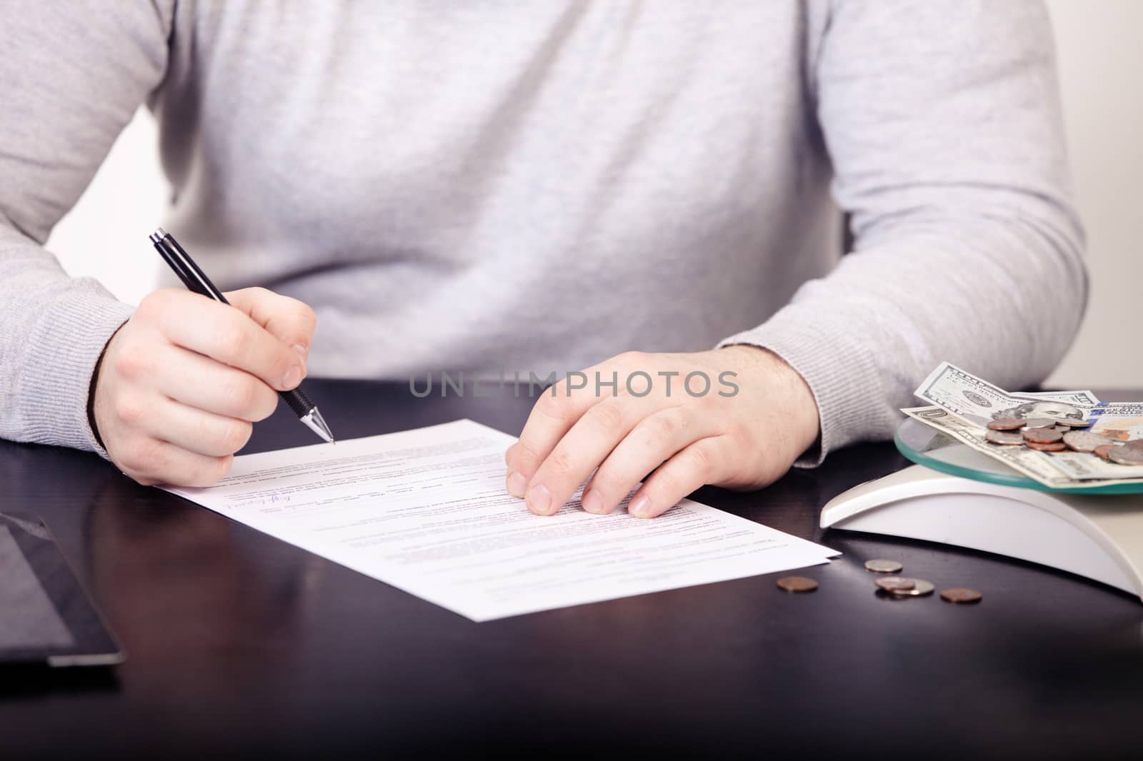 Business adviser analyzing financial figures denoting  progress in the work of the company.