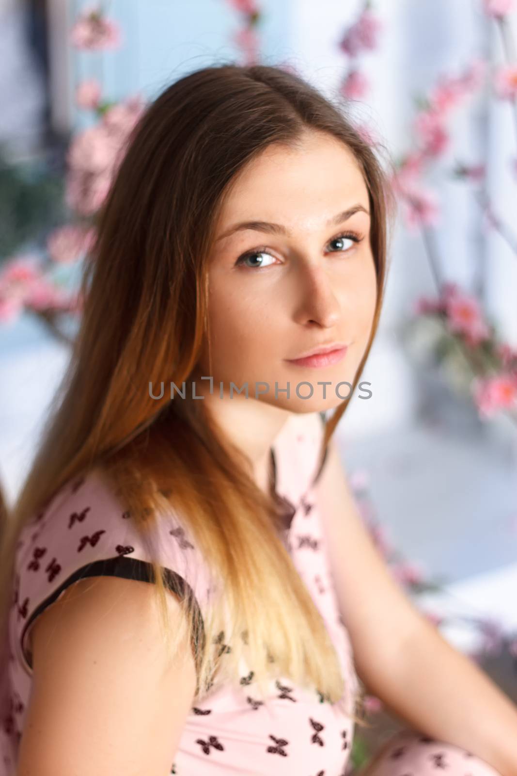 beautiful blonde girl in spring cherry garden by victosha