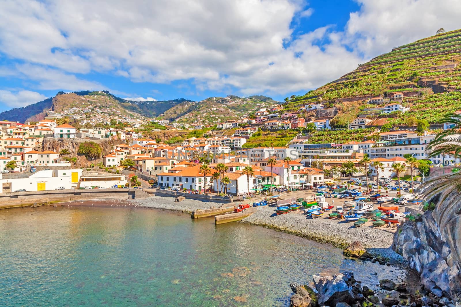 Camara de Lobos, Madeira - June 8, 2013: Port with fishing boats. The village is typical for its cat shark drying under the sun.