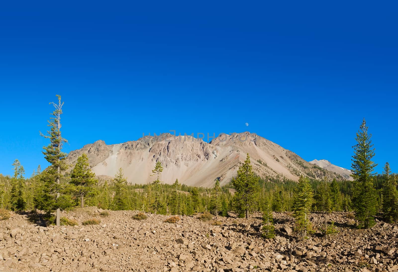 Mount Lassen with deposit of rocks ejected in the eruption. Mount Lassen is an active volcano in California.