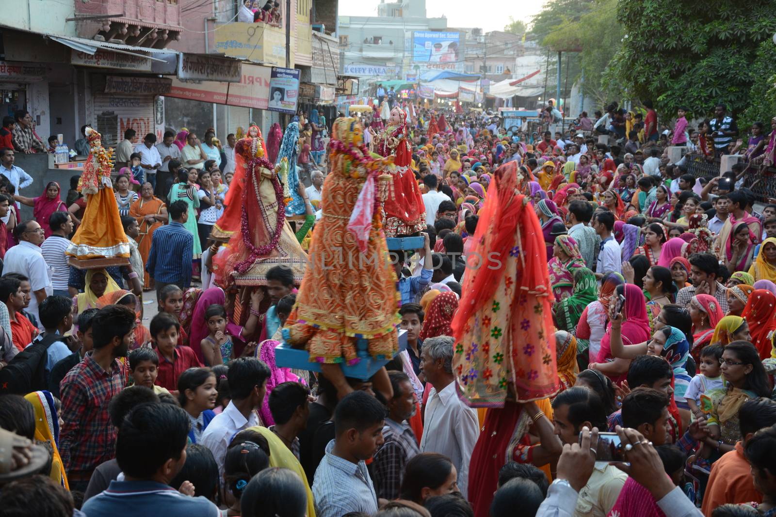 INDIA, Bikaner: Devotees take part in the traditional procession during the Gangaur festival at the Junagarh fort  in Bikaner on April 10, 2016.During the Gangaur festival, married women worship the Hindu goddess Gauri, consort of the deity Shiva. 