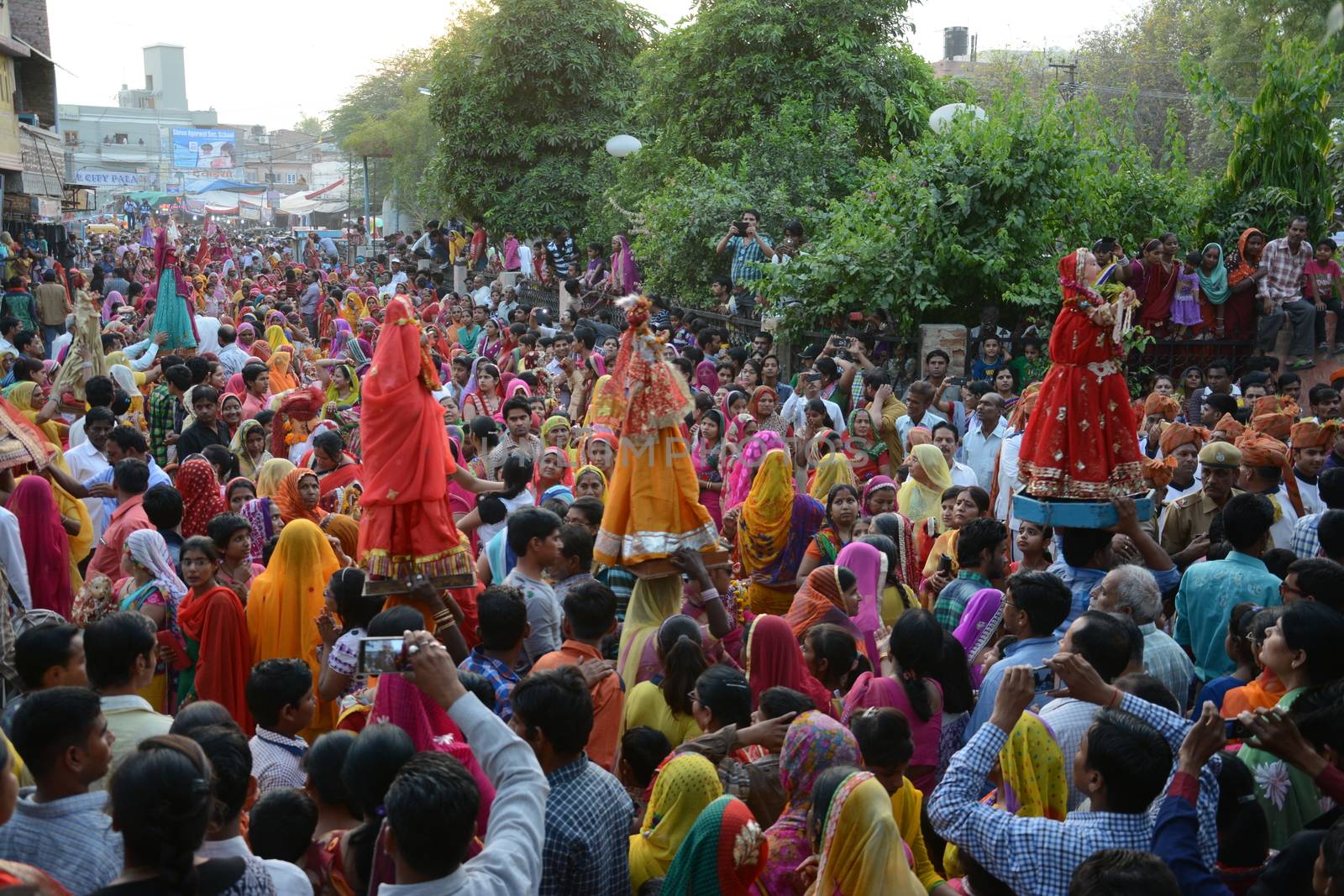 INDIA, Bikaner: Devotees take part in the traditional procession during the Gangaur festival at the Junagarh fort  in Bikaner on April 10, 2016.During the Gangaur festival, married women worship the Hindu goddess Gauri, consort of the deity Shiva. 