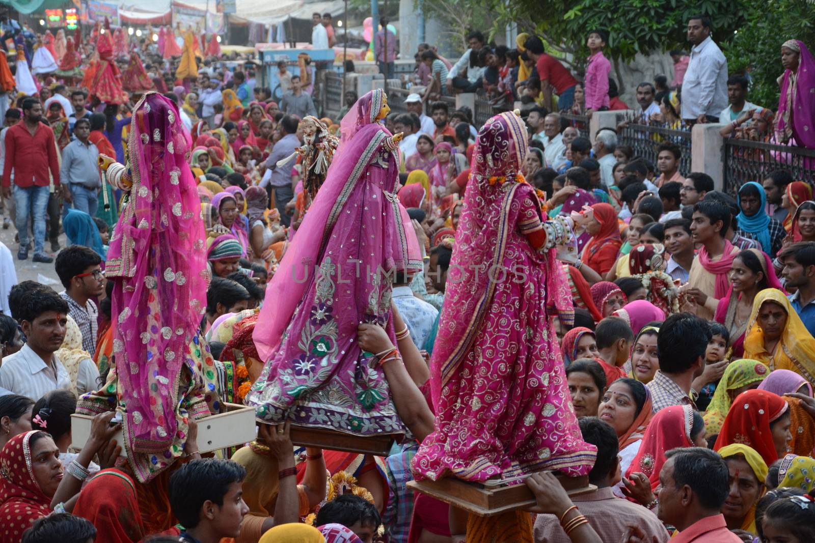 INDIA, Bikaner: Devotees take part in the traditional procession during the Gangaur festival at the Junagarh fort  in Bikaner on April 10, 2016.During the Gangaur festival, married women worship the Hindu goddess Gauri, consort of the deity Shiva. 