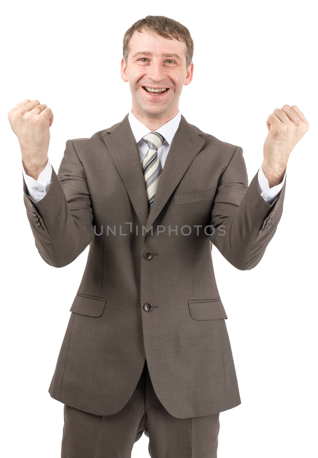 Successful businessman raised his hands up in front of him. Isolated on white background