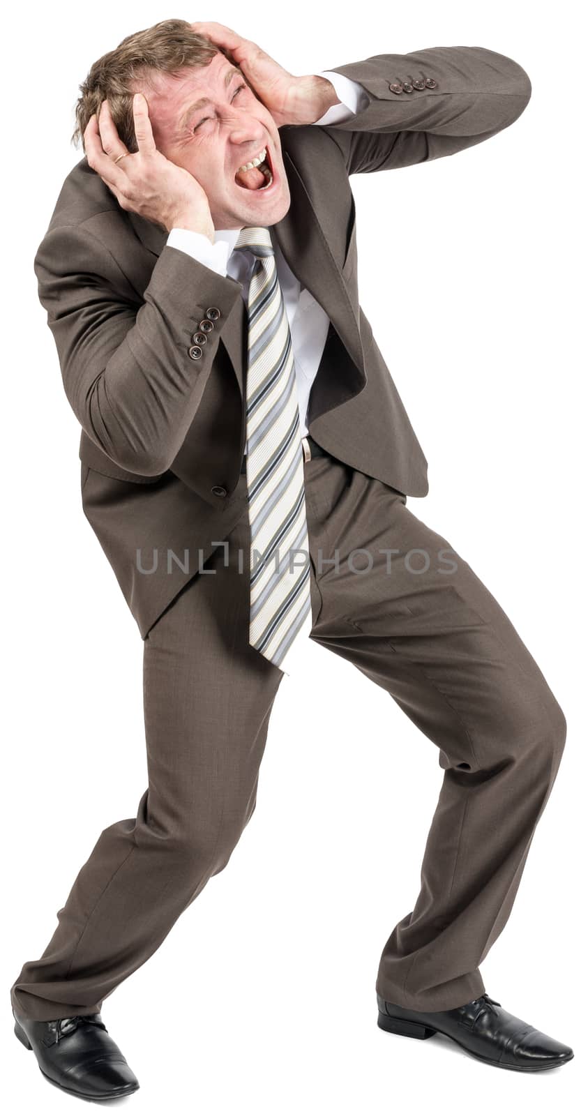 Screaming businessman covering his ears isolated on white background, closeup