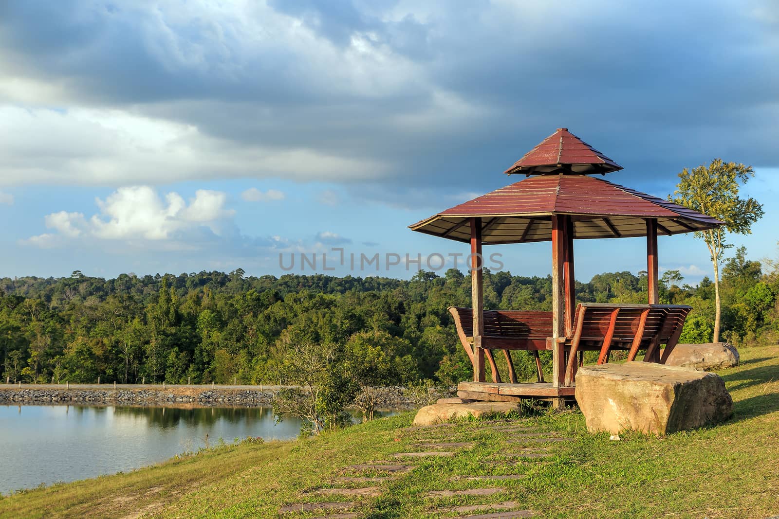 Wooden gazebo and lake with blue sky Thailand