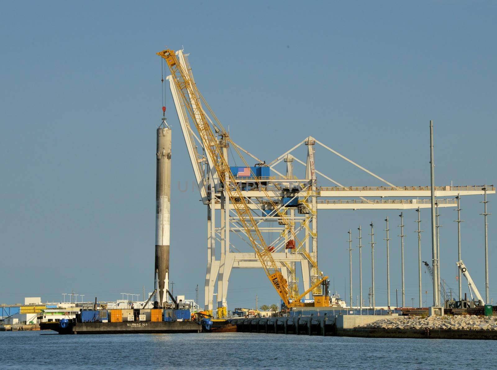 UNITED STATES, Port Canaveral: The first stage of a SpaceX Falcon 9 rocket is seen on the drone ship 'Of course I still love you' docked at Port Canaveral, on April 12, 2016, after its successful landing in the Atlantic Ocean.