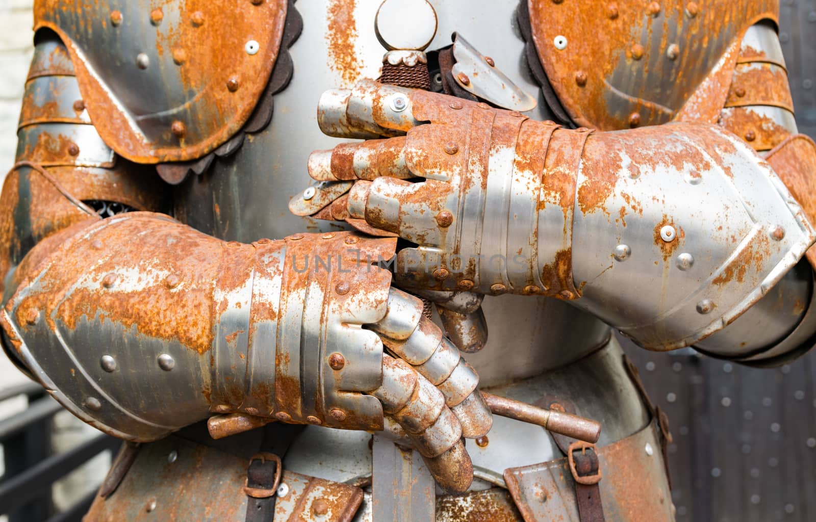 Detail of an old rusty medieval armor.
