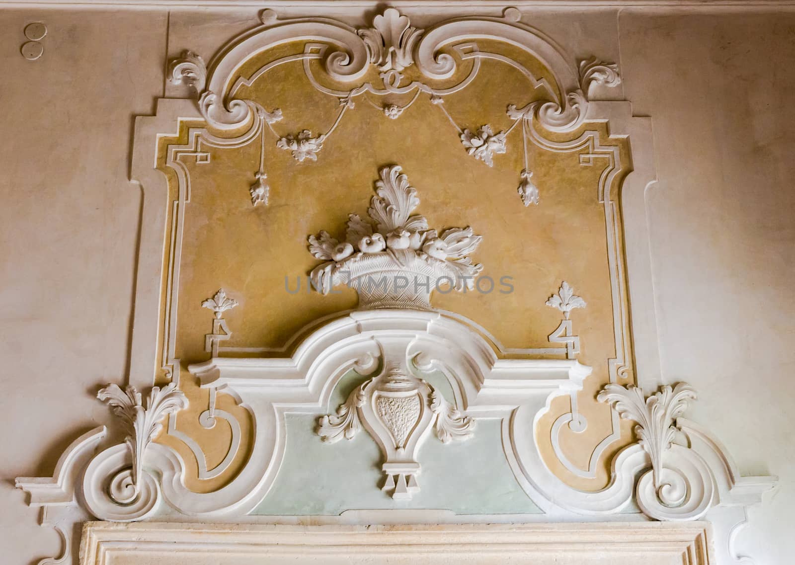 The ornament of a fireplace hood in a Venetian neo classical villa.