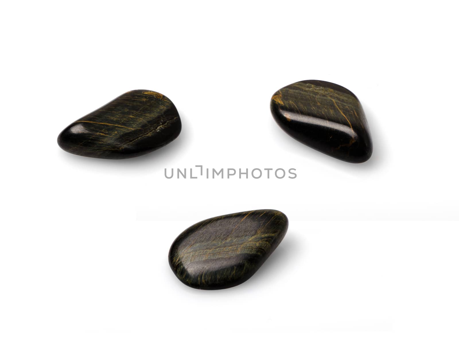 Glossy hawk eye gem shot from three angles isolated on white background.
