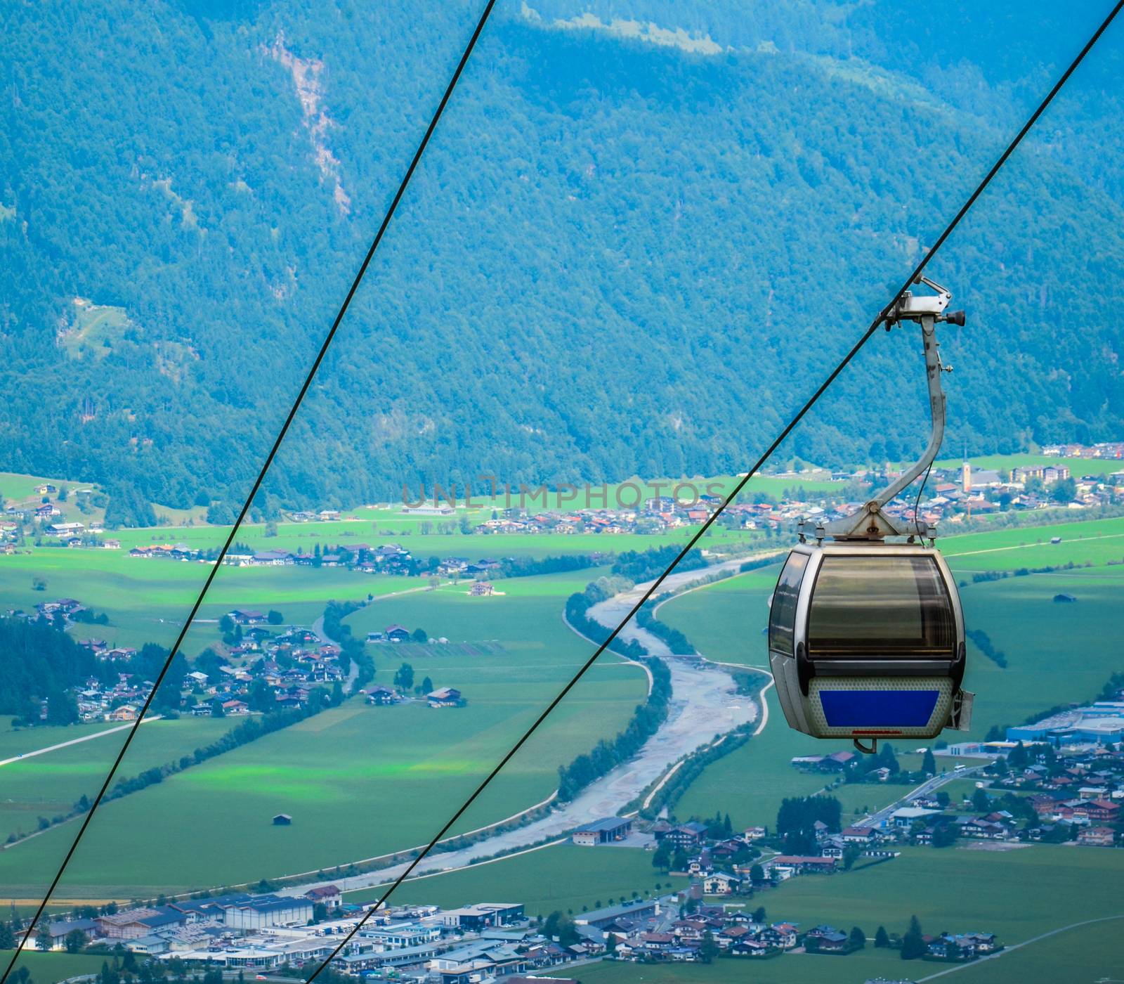 A Cable Car On An Alpine Mountainside In Austria In Summer