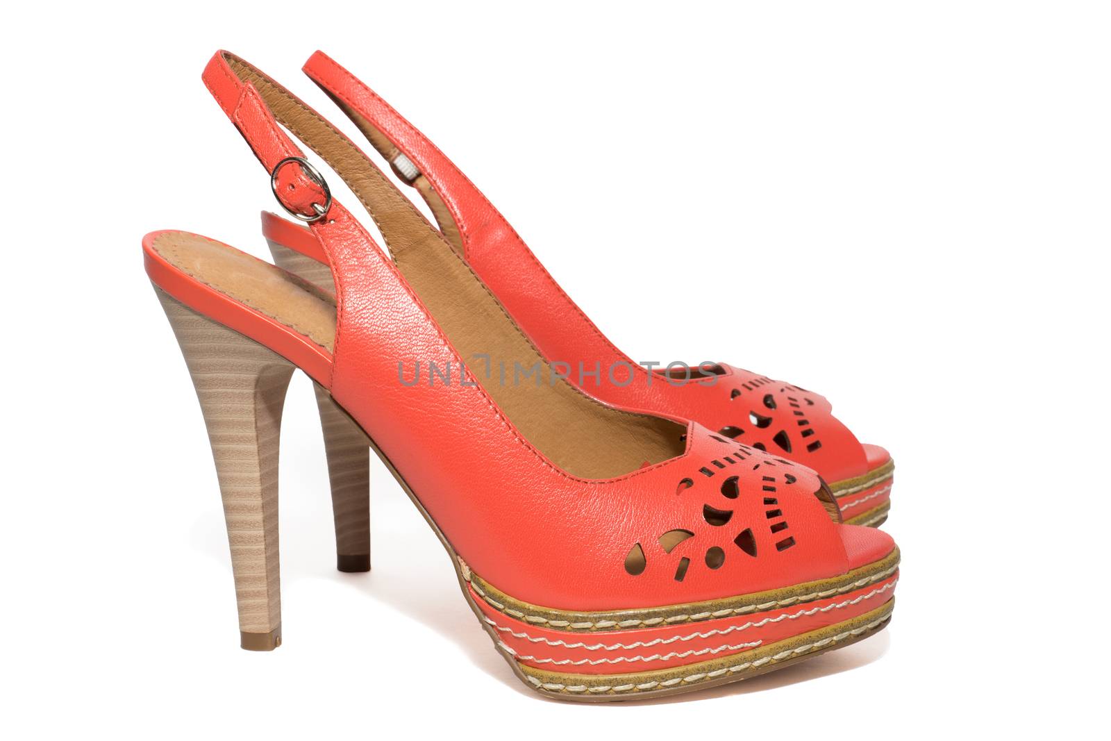 The photo shows women's shoes on a white background
