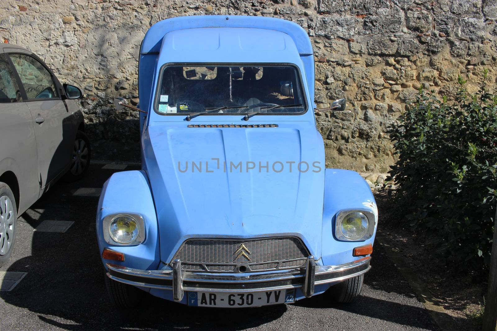 Perouges, France - March 26, 2016: Blue Citroen Acadiane Parked in the Street of Perouges, France