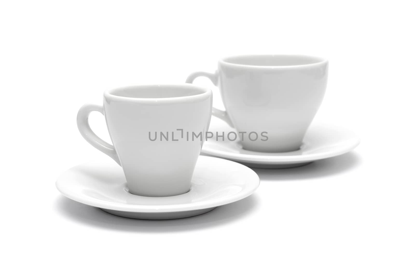 Small white coffee cup isolated on white by DNKSTUDIO