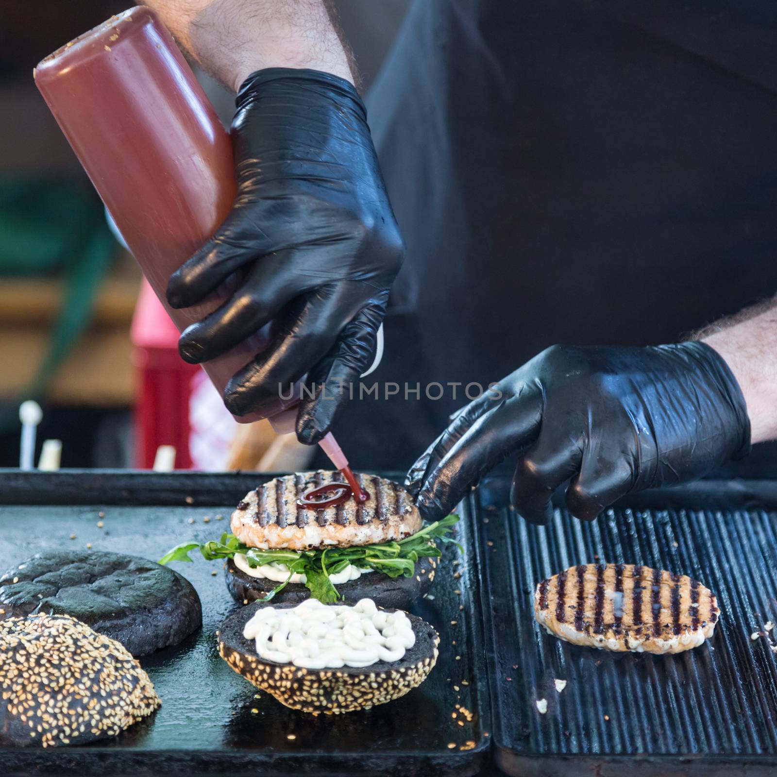 Beef burgers ready to serve on food stall. by kasto