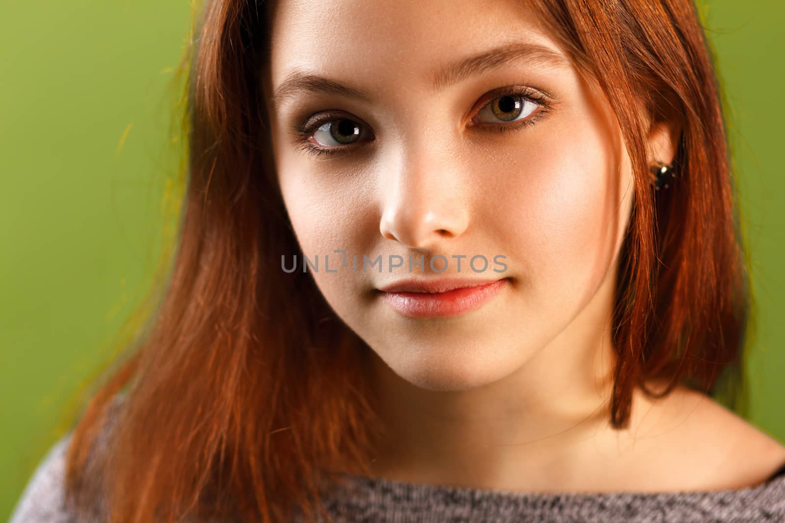 Teenage girl on green background by DmitryOsipov