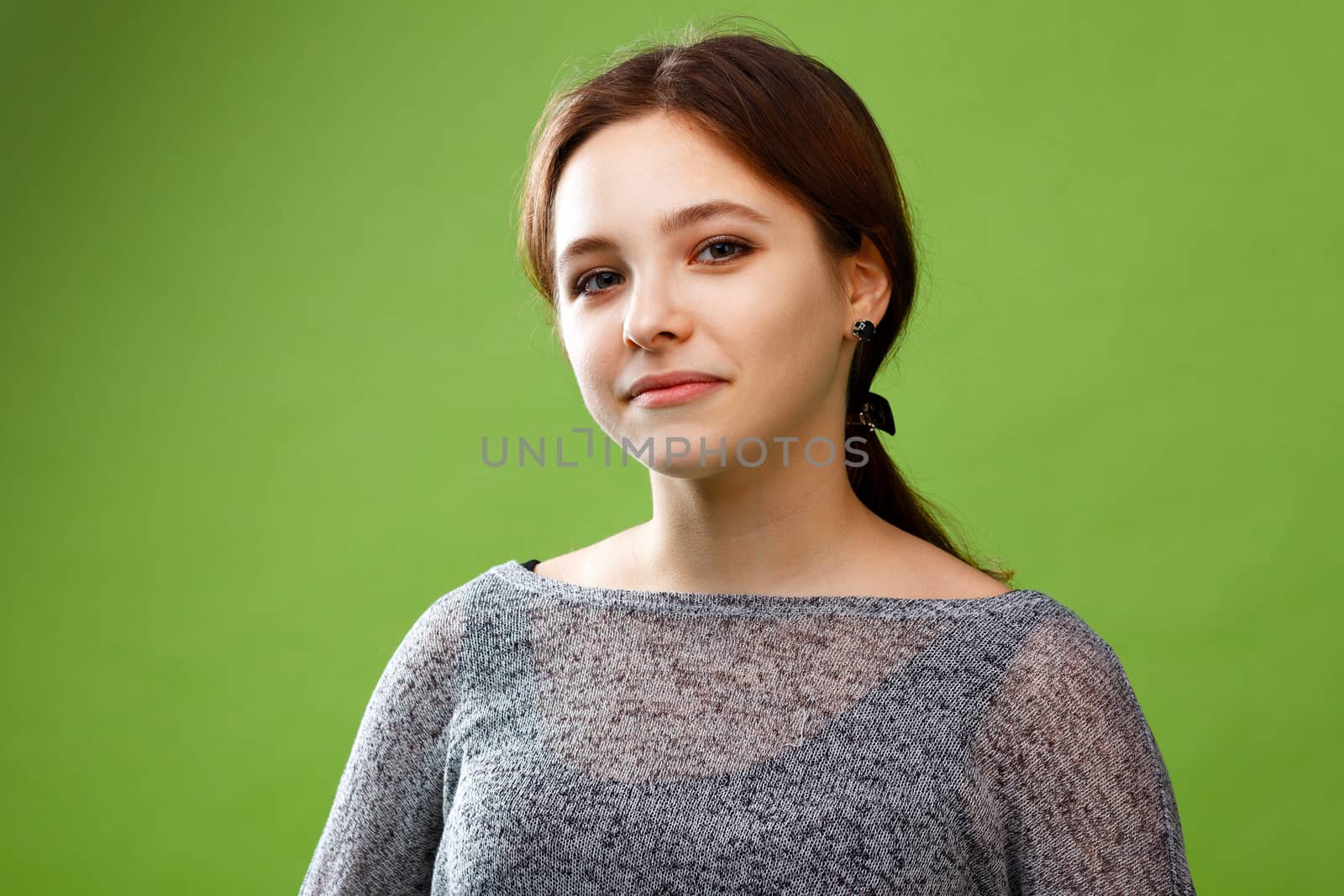 Teenage girl on green background by DmitryOsipov