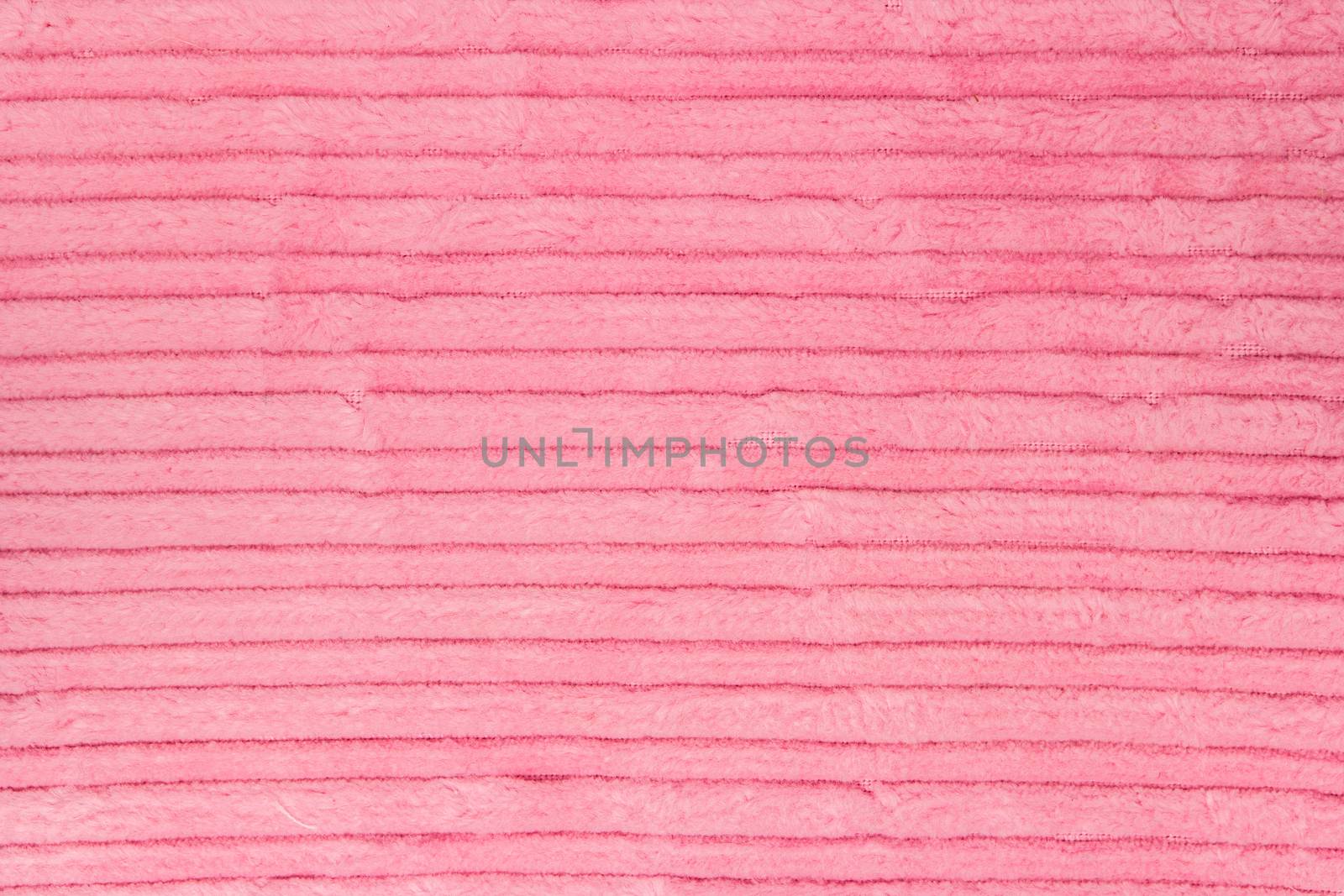 Ribbed pink corduroy texture. Useful for background