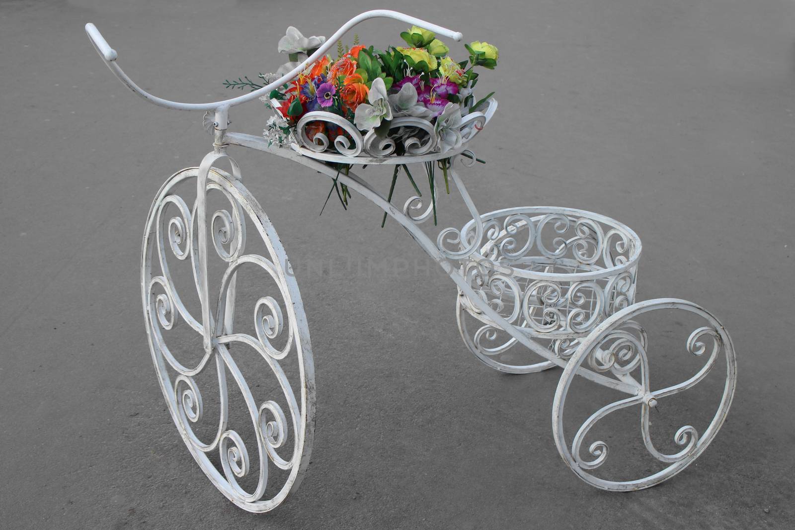 Decorative Vintage Old Bicycle Equipped With Basket Of Flowers