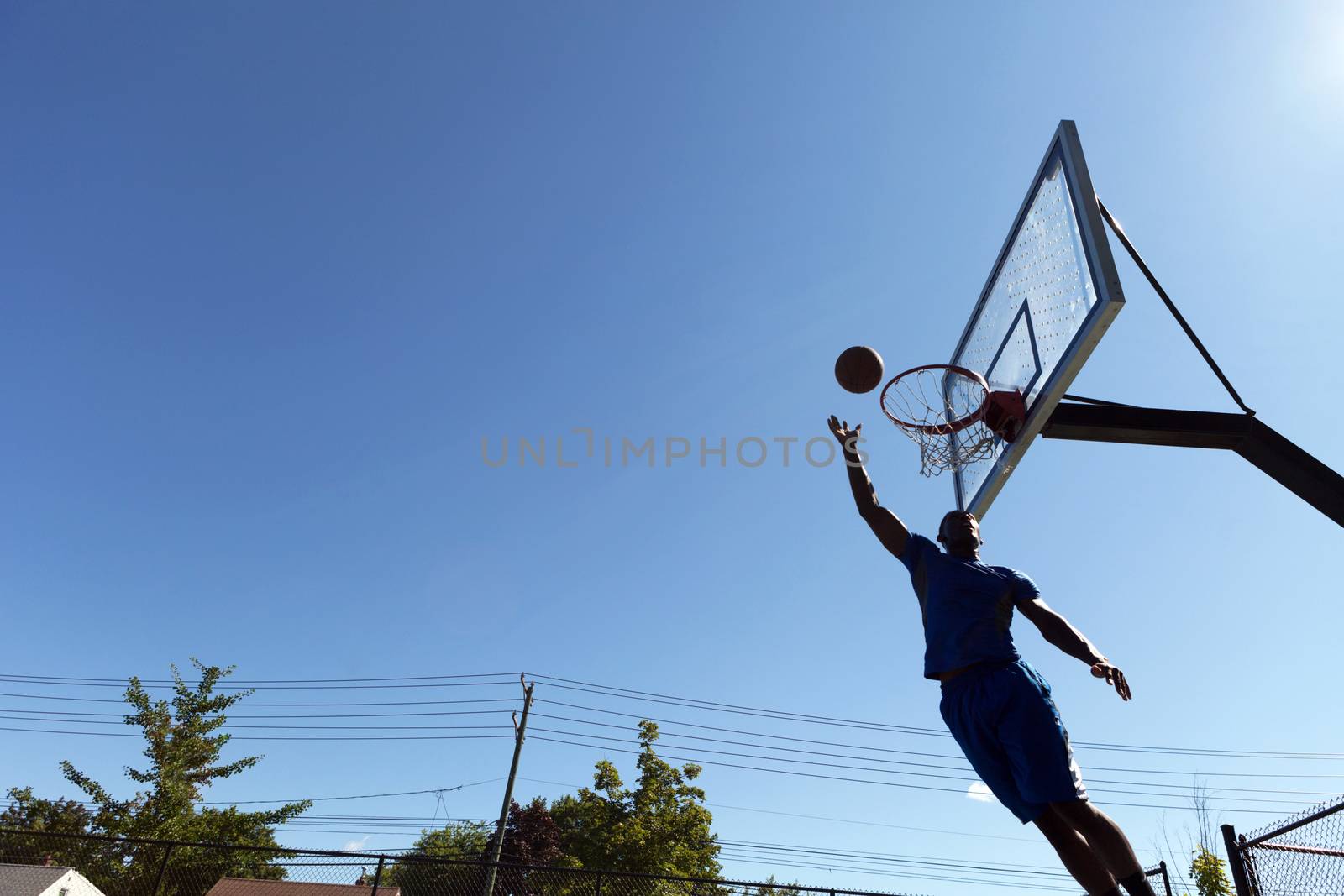 Basketball Layup Silhouette by graficallyminded