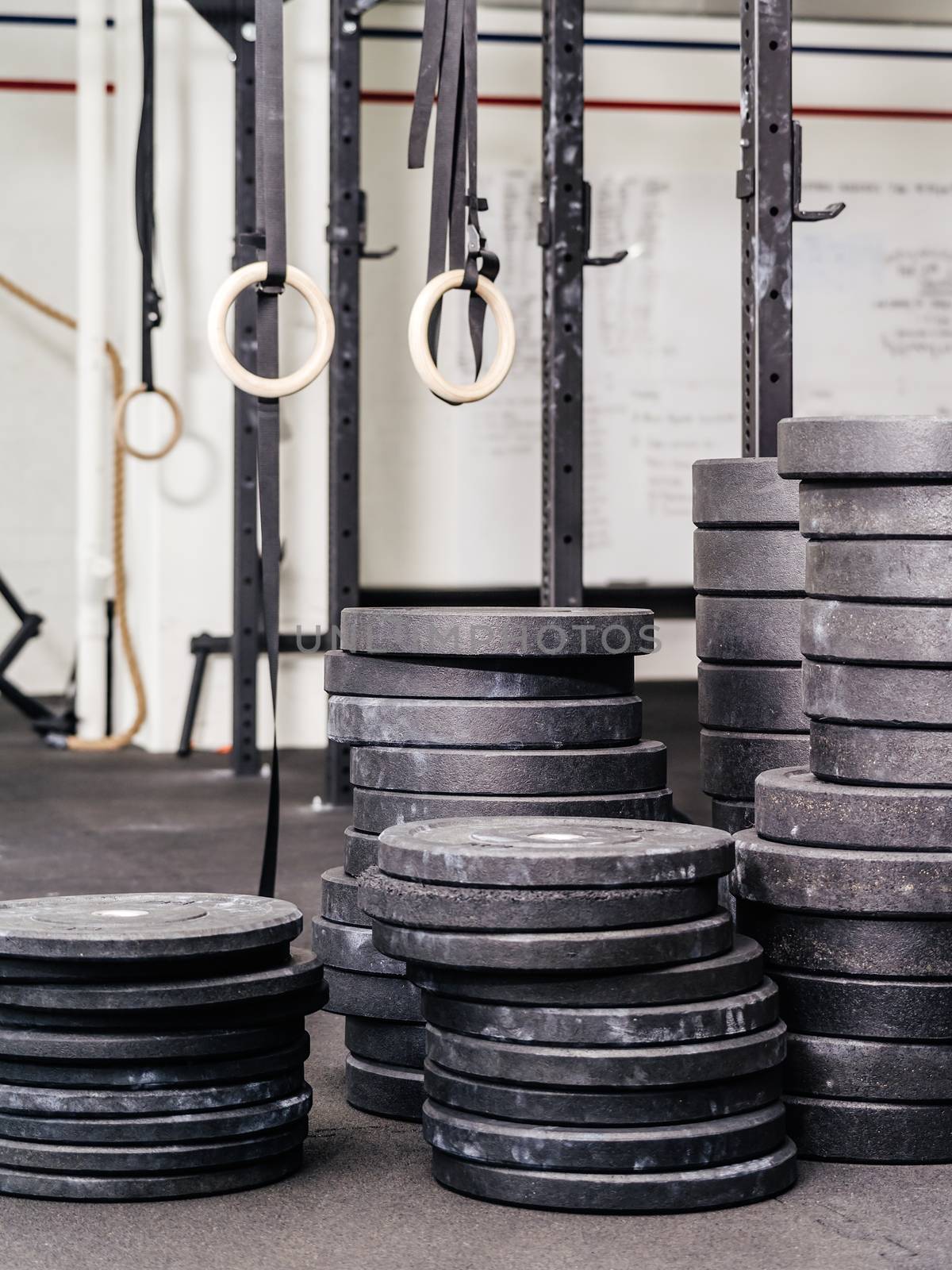 Stacks of weights at the gym by sumners