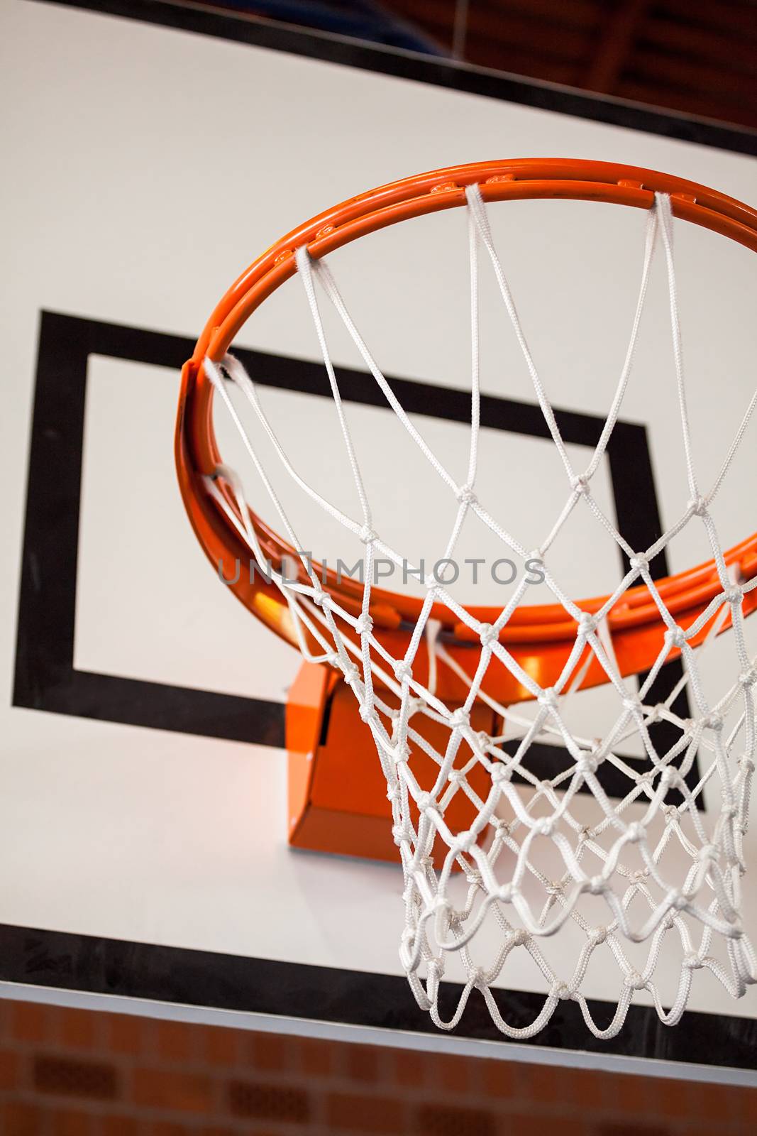 Photo of an indoor basketball hoop.