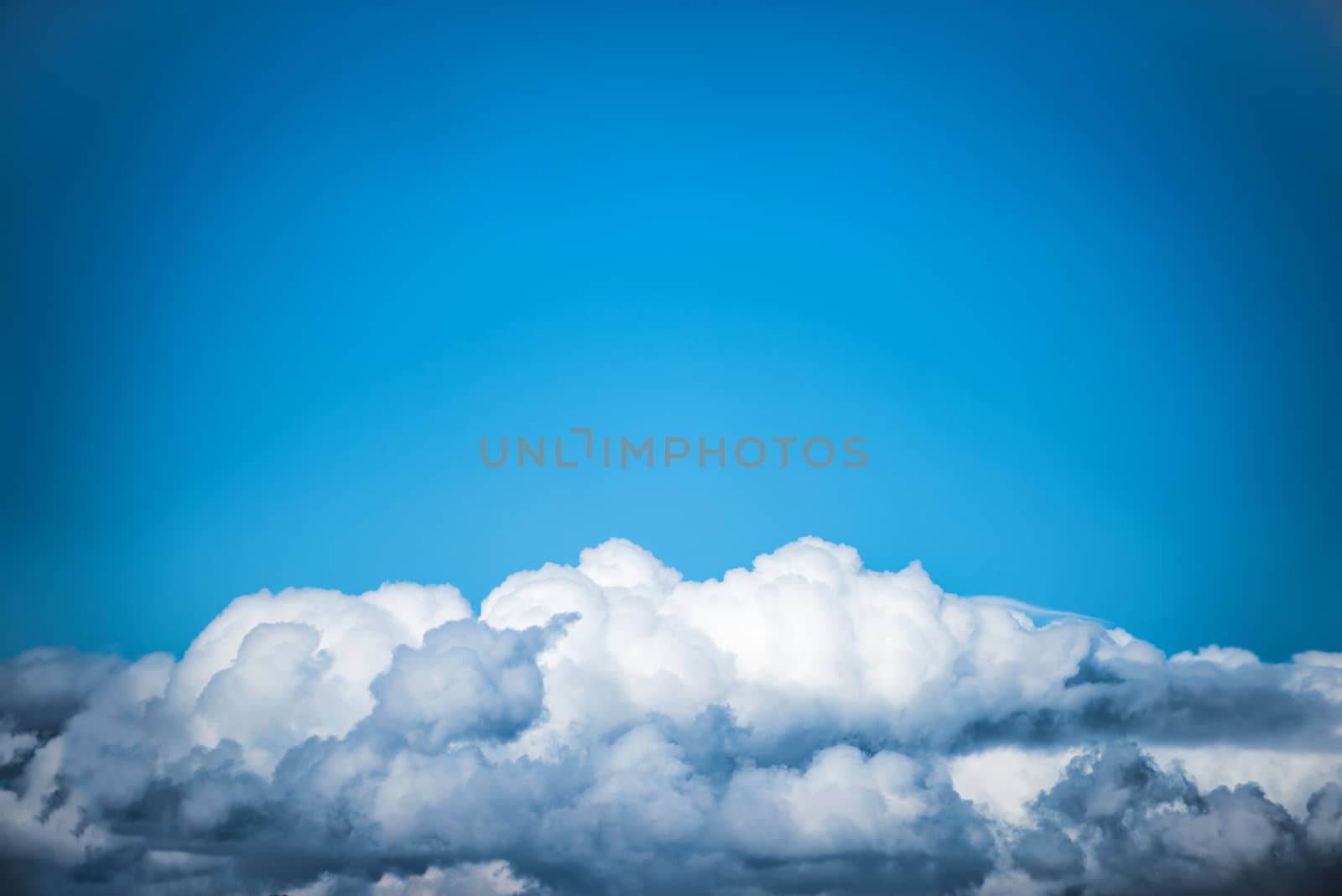 White clouds on the blue sky. Nature background