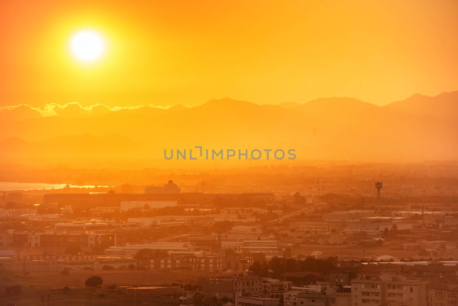 Sunset over european city. Cagliari, Sardinia, Italy.