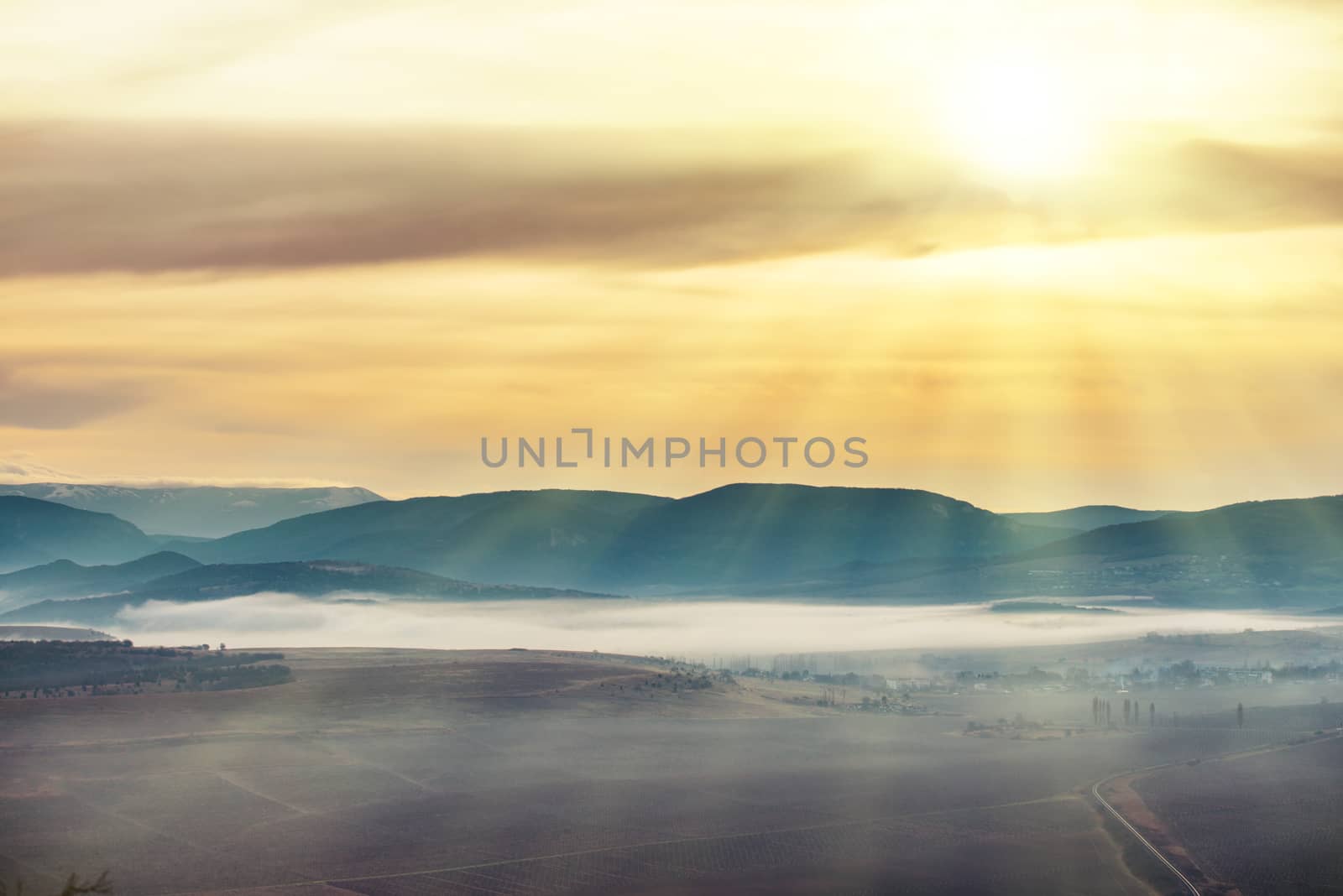 Blue mountains covered with mist by vapi