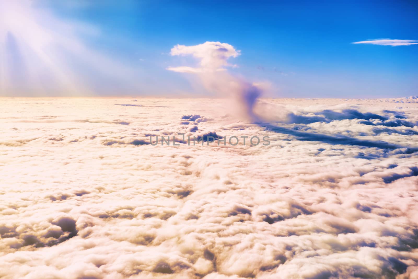 Blue sky and clouds. Plane view above the earth, can be used for background