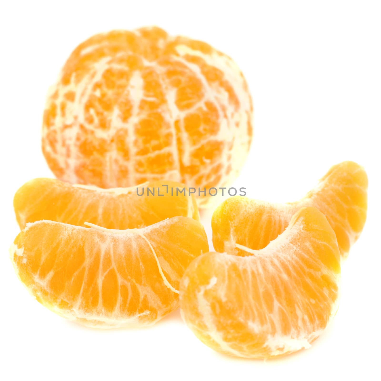 Orange peeled mandarin and slices without skin isolated on white background