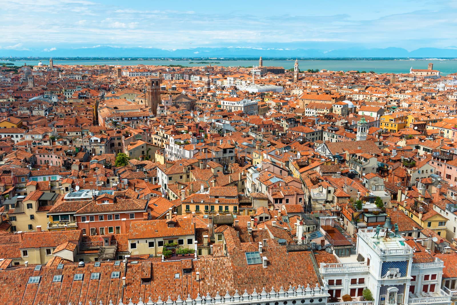 Venice roofs from above. Aerial view of houses, sea and palaces from San Marco tower