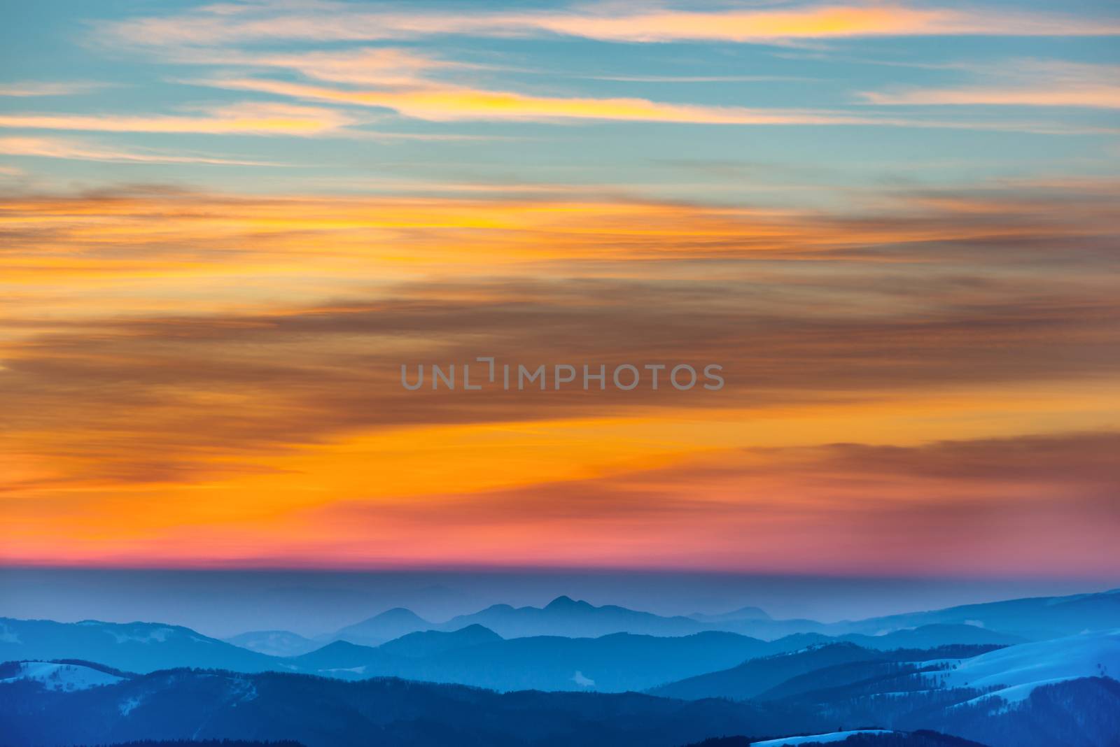 Sunset in winter mountains by vapi