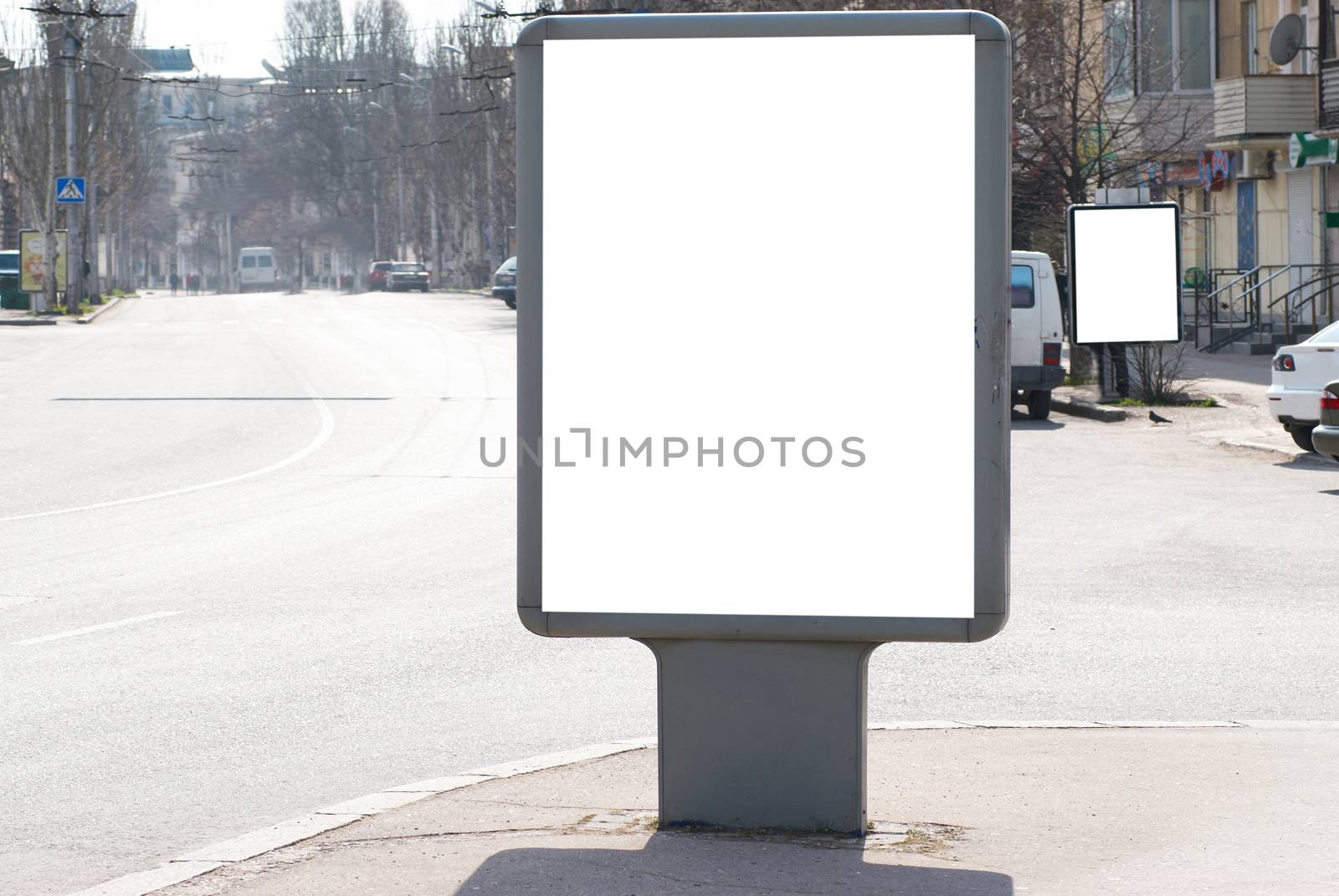 Vertical blank billboard white isolated on the city street