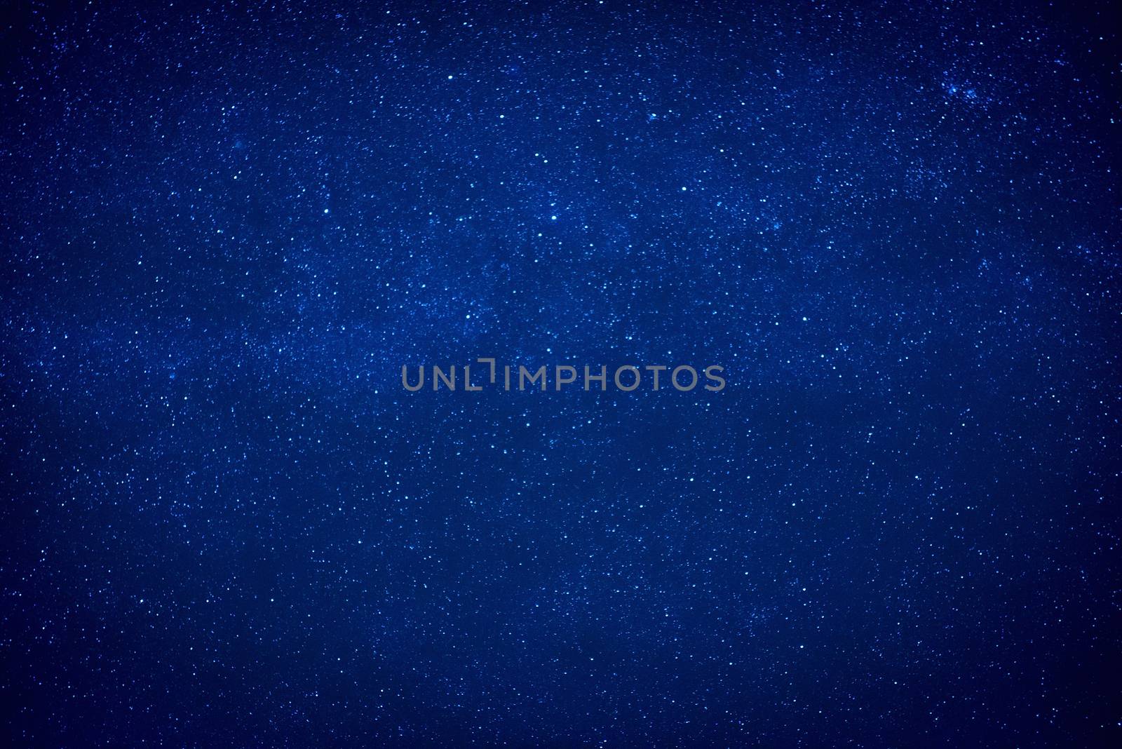 Blue dark night sky with many stars. Milky way like space background