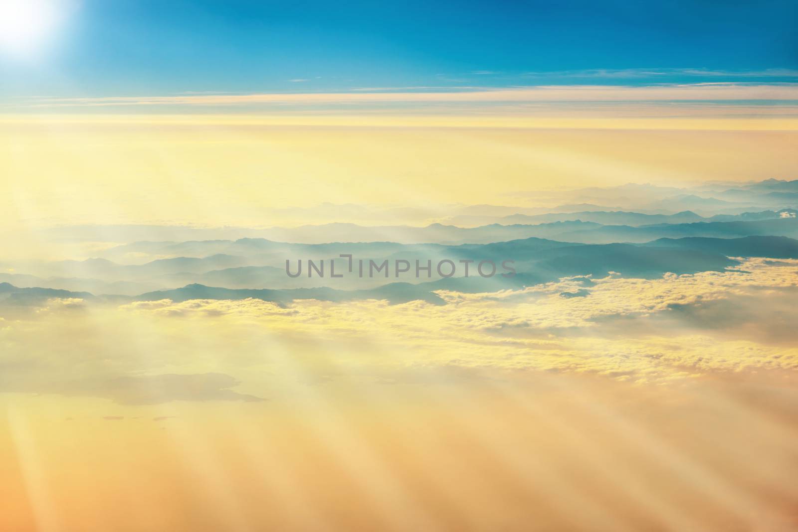 View from a plane to sunset on the sky by vapi