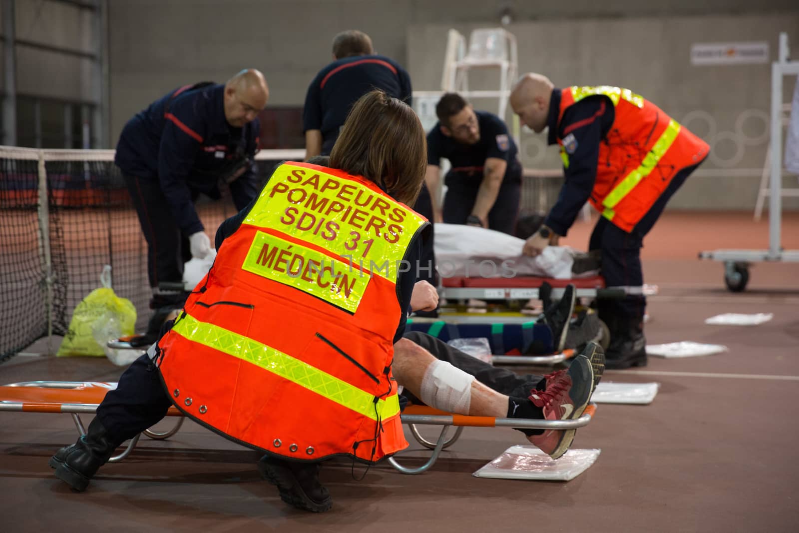 FRANCE, Toulouse: Rescuers and firemen take part in a simulation exercice of terrorist attack at the Toulouse stadium on April 14, 2016 as part of the Euro 2016. 