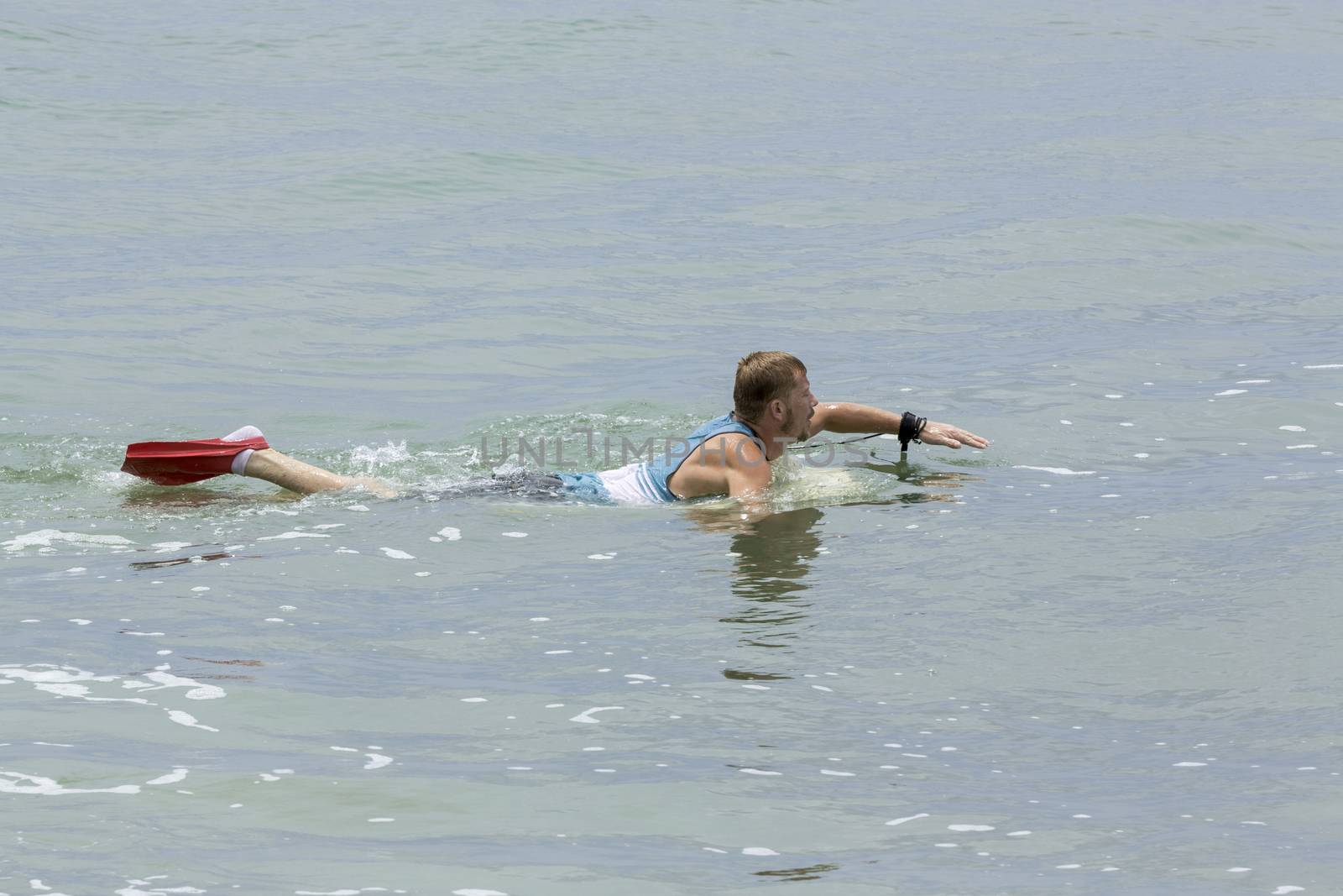 Man Body Boarder surfing on the waves Sea beach