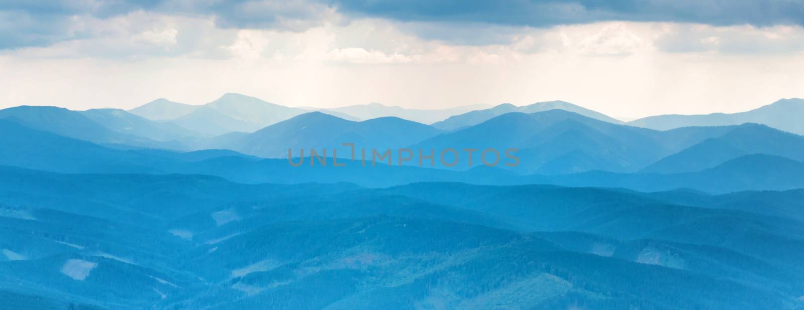 Blue mountains. Panorama view of peaks ridge