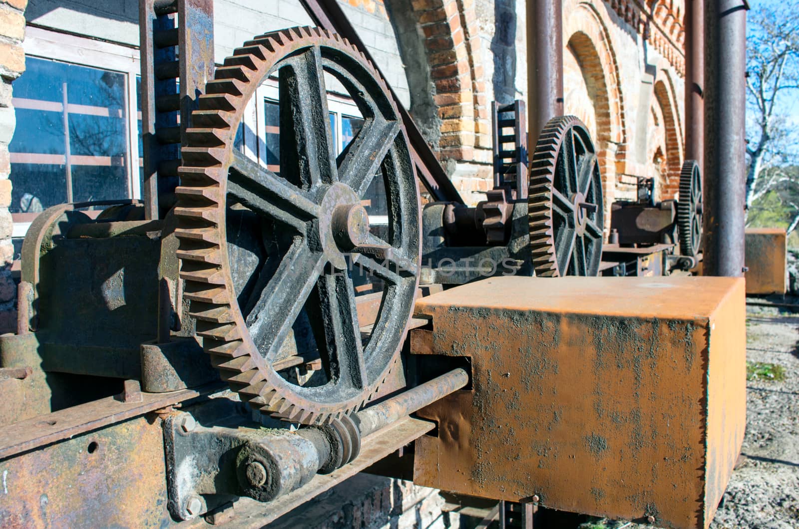 Old rusty gears, machinery parts. by dolnikow