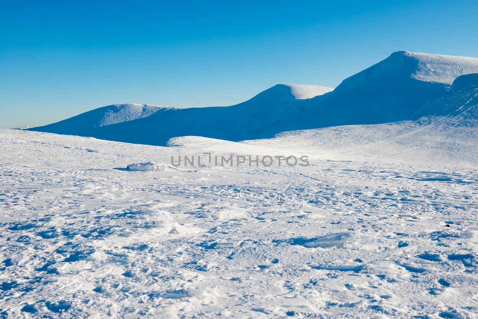 Beautiful snow in winter mountains. Natural christmas landscape