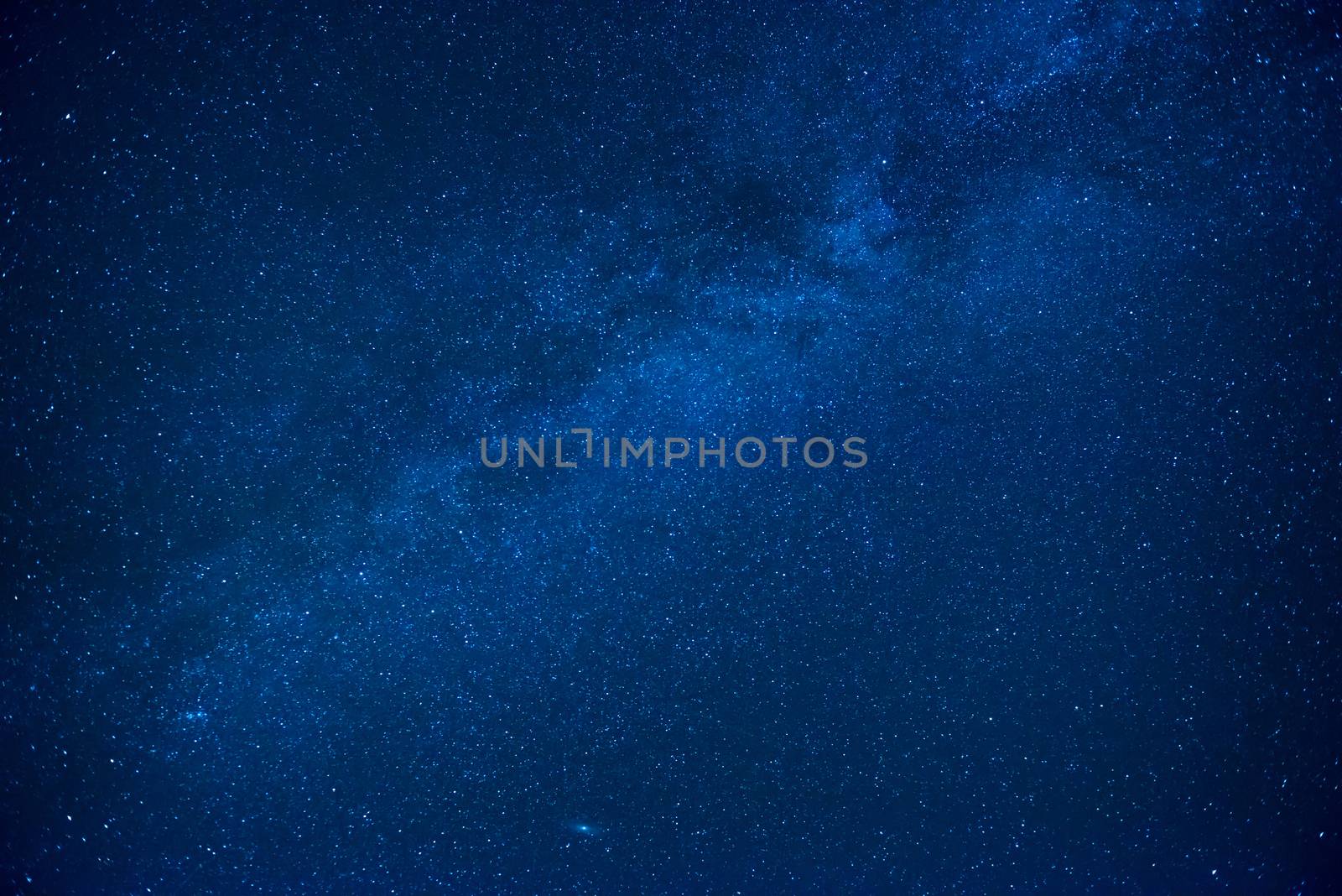 Blue dark night sky with many stars. Milkyway cosmos background