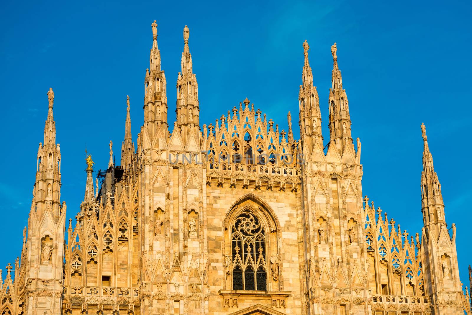 Night view of famous Milan Cathedral (Duomo di Milano) on piazza in Milan, Italy