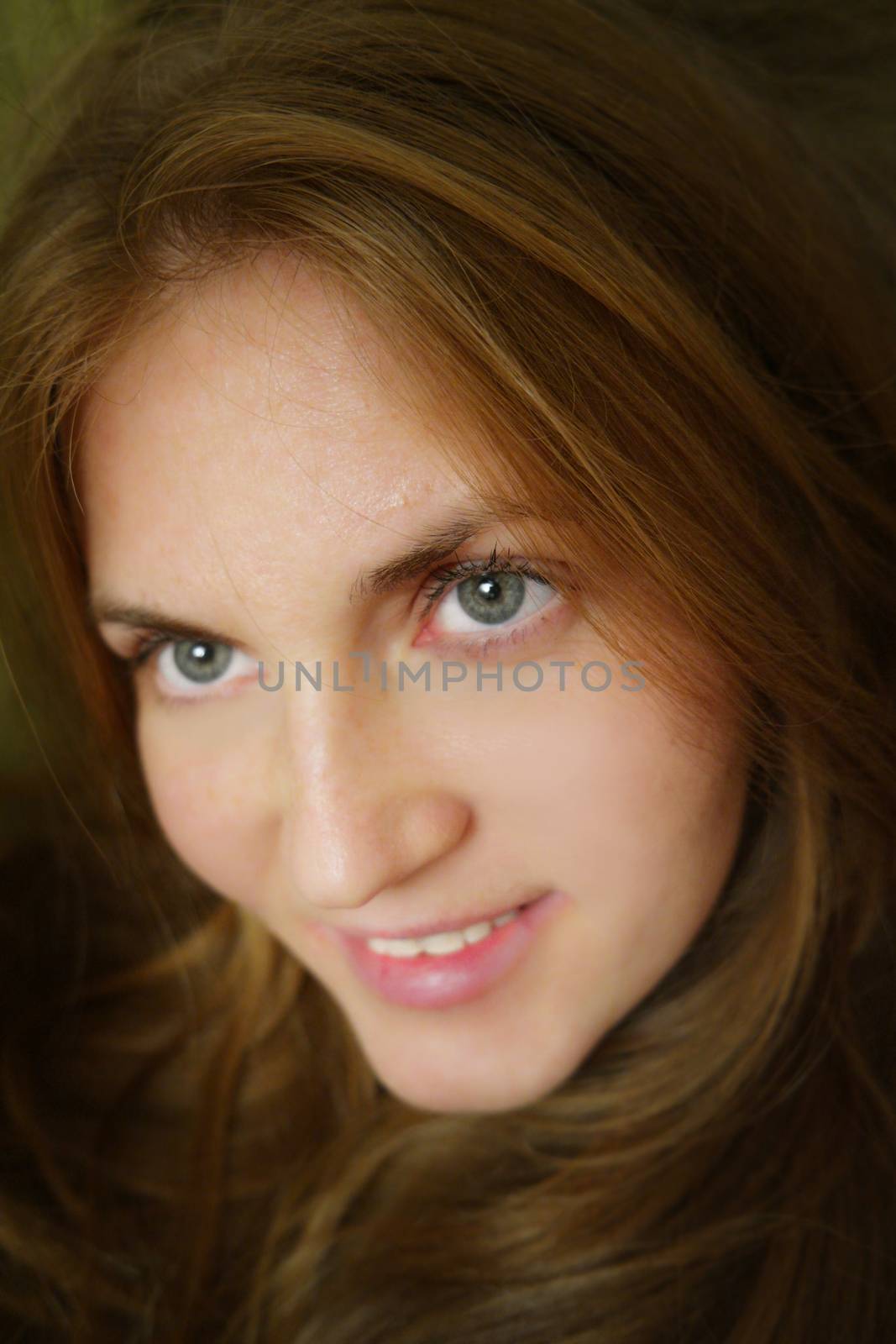 Pretty young woman with red hair by vapi