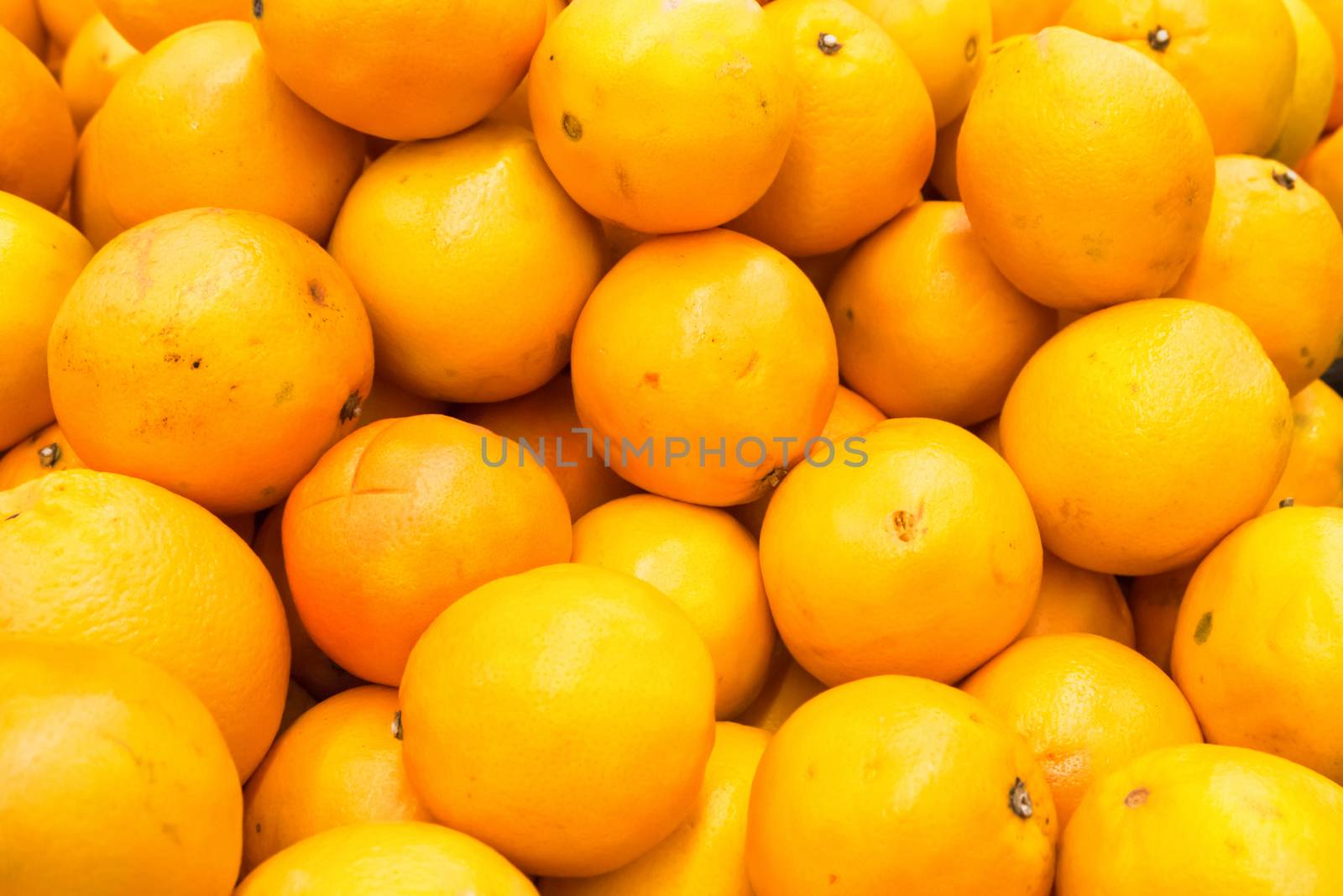 Pile of fresh oranges and mandarins by vapi