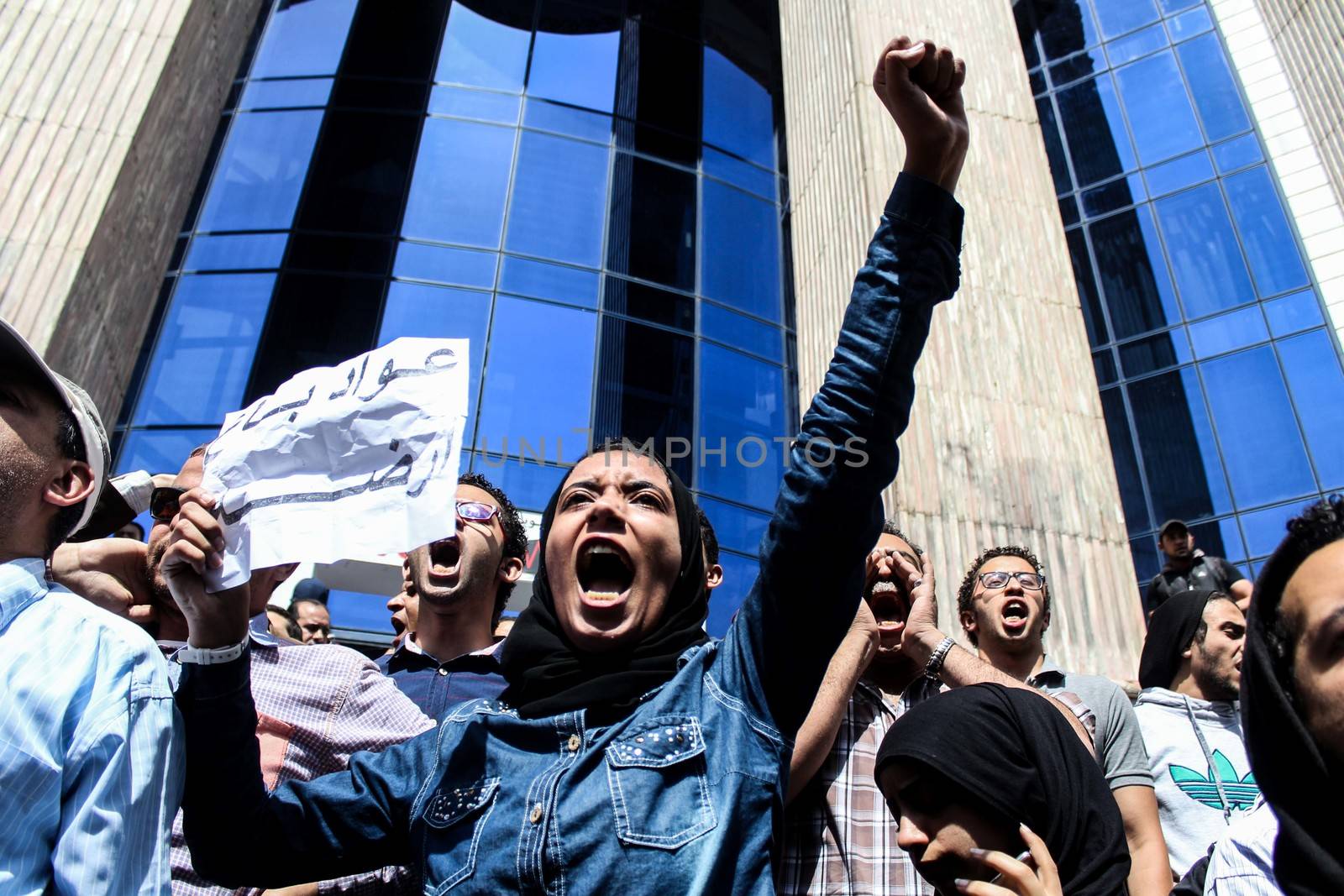 EGYPT, Cairo: Protesters cry out as thousands rally in front of the Syndicate of Journalists in Cairo on April 15, 2016 during a demonstration against the decision to hand over control of two strategic Red Sea islands, Tiran and Sanafir, to Saudi Arabia.