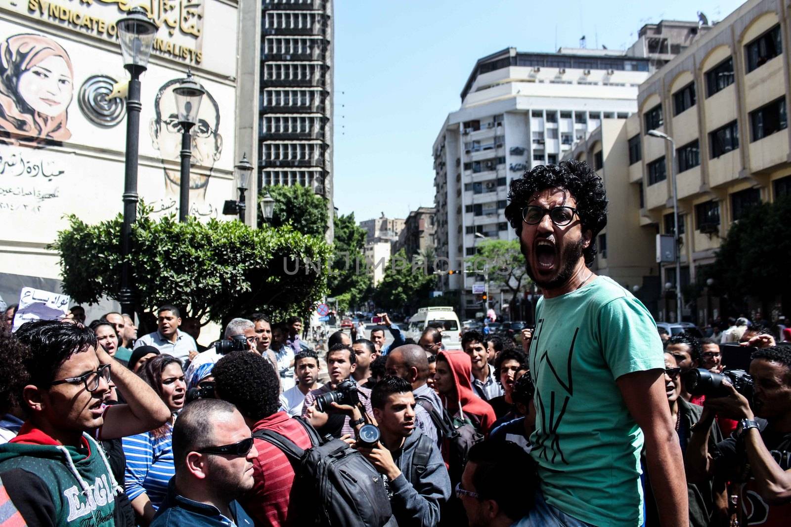 EGYPT, Cairo: A protester cries out as thousands rally in front of the Syndicate of Journalists in Cairo on April 15, 2016 during a demonstration against the decision to hand over control of two strategic Red Sea islands, Tiran and Sanafir, to Saudi Arabia.