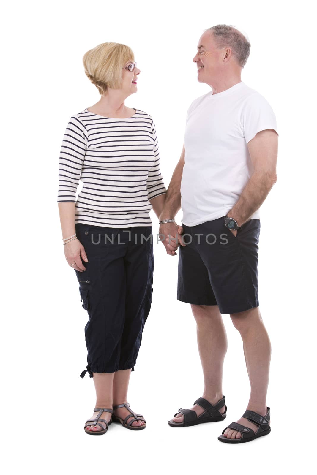 retired couple wearing casual outfits on white isolated background